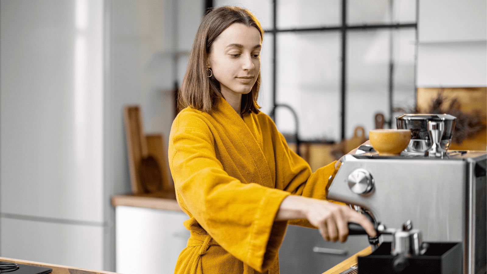 Woman Making Coffee in the Morning at Home